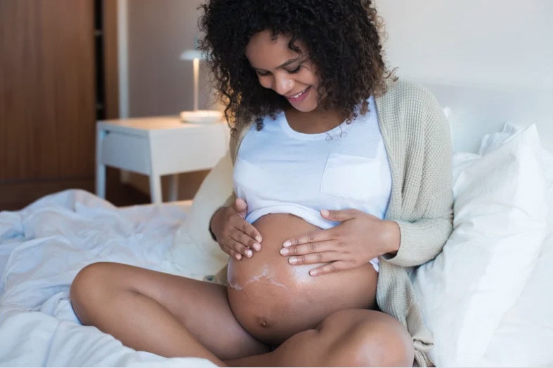 femme-enceinte-crème-mustela
